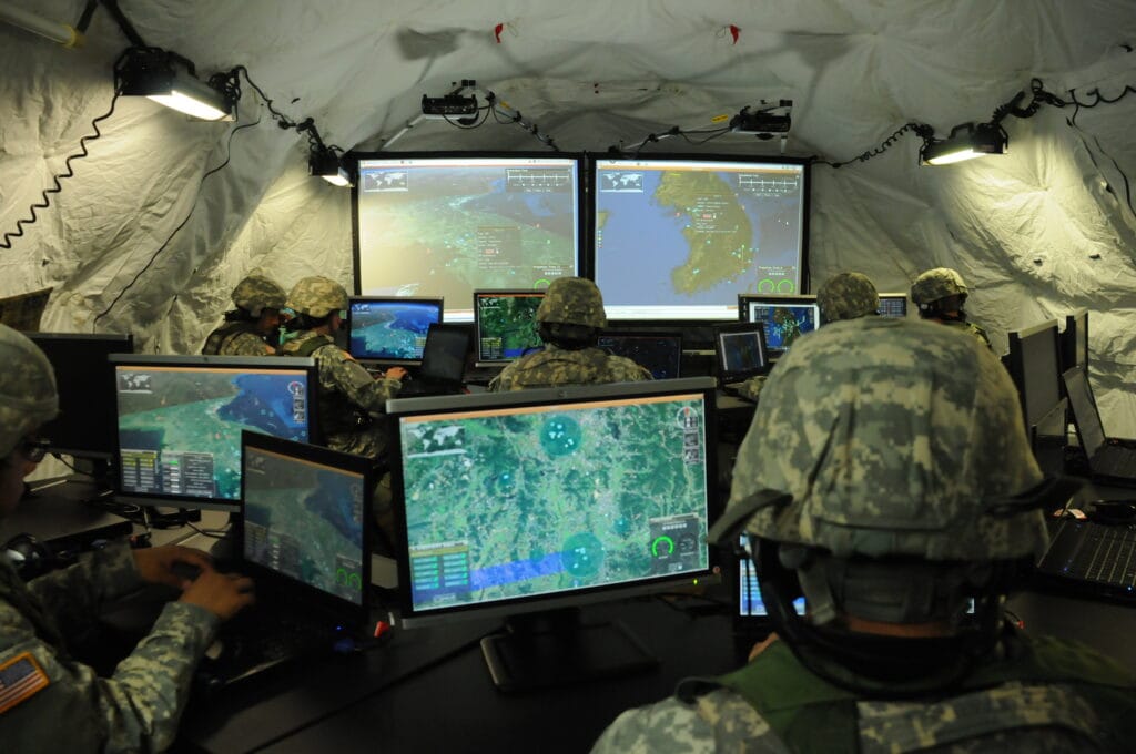 U.S. military officials tracking airstrikes on Yemen from a command center.